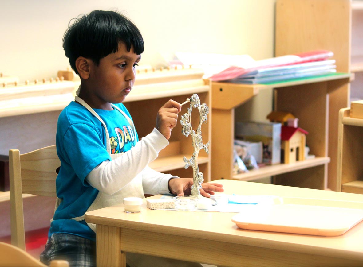 https://www.leportschools.com/images/blog/the-dual-purpose-of-montessori-preschool-practical-life-activities/7-montessori-infant-care-irvine-huntington-beach.jpg